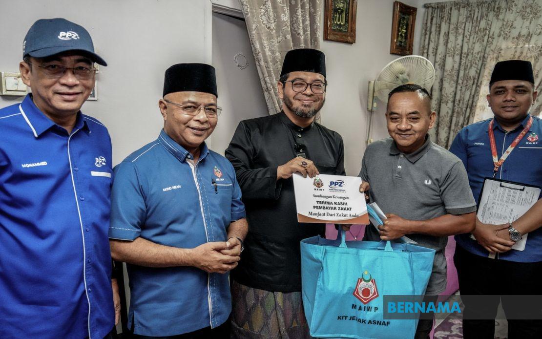MAIWP Extends Aid Package to Widow Caring for Five Children