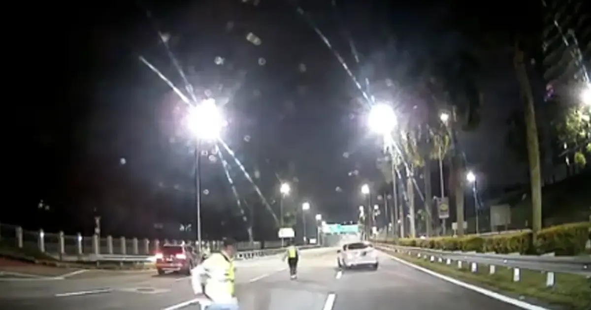 Police Arrest Young Driver After Forcing Through Roadblock