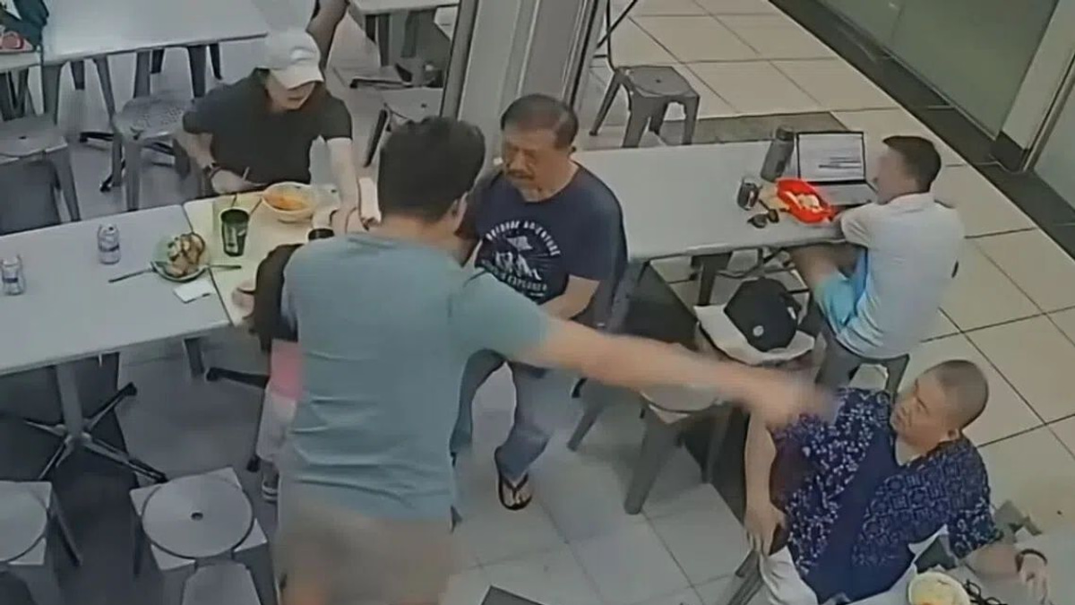 Singapore Police Investigate Assault on Elderly Man After Head-Patting Incident at Coffee Shop