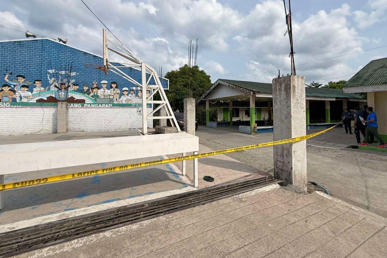 Philippine police detain 14-year-old over school attack threat linked to Tacloban shooting