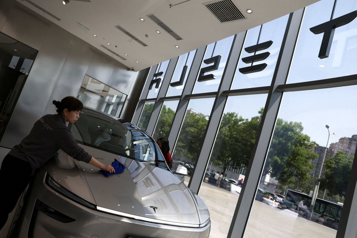 Tesla ordered to recall 3 million vehicles in China over door-handle safety flaws