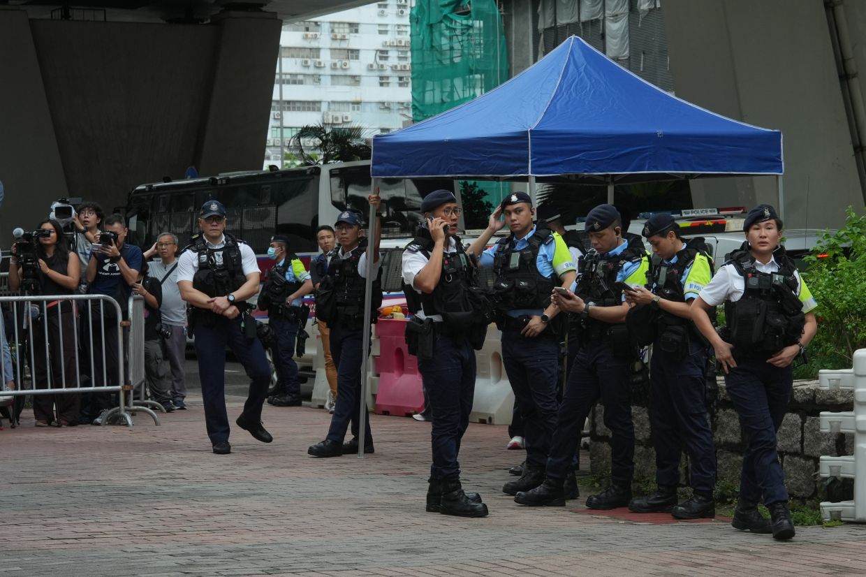 Hong Kong Woman Arrested for Alleged Seditious T-Shirt at Court