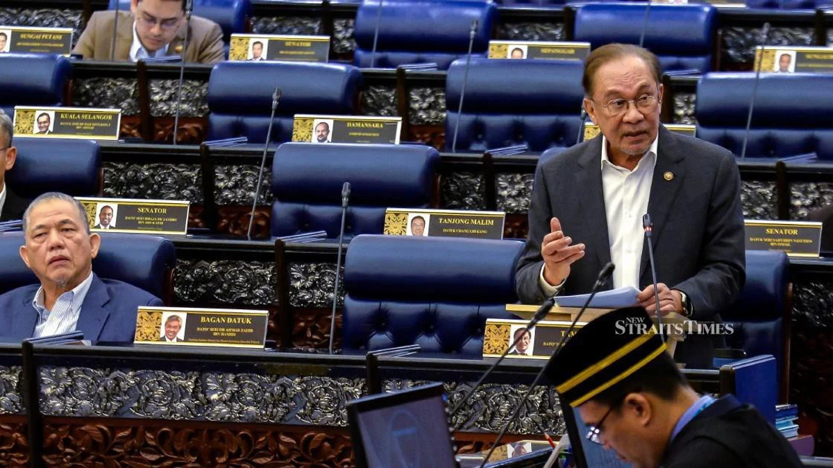 E-wallet Companies Face Mandatory Victim Payouts If Security Fails, Anwar Says