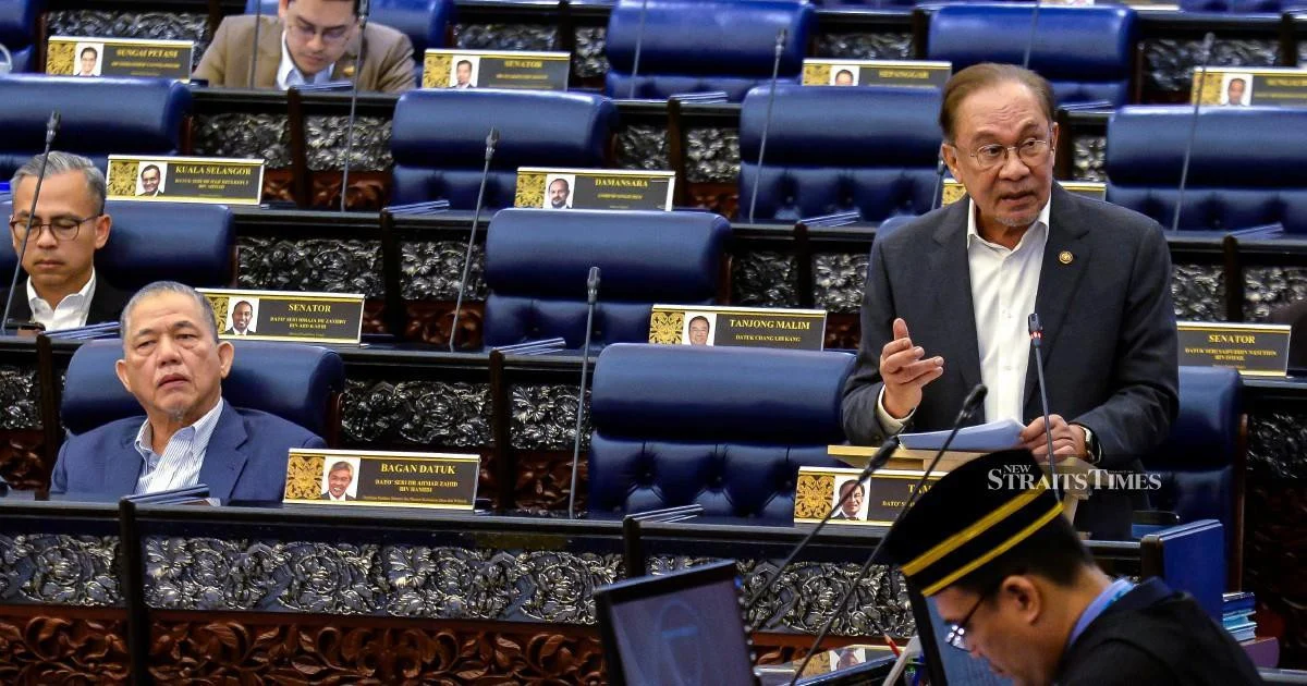 E-wallet Companies Face Mandatory Victim Payouts If Security Fails, Anwar Says