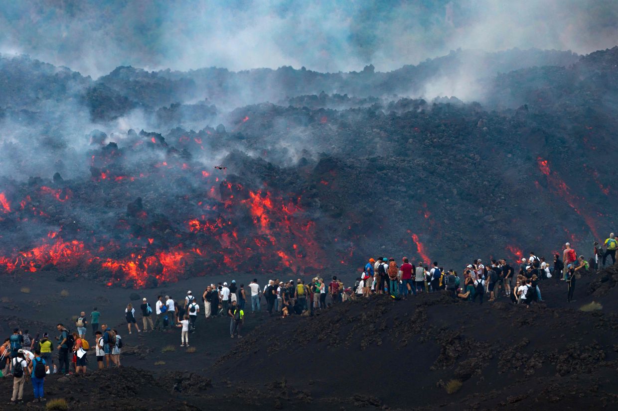 Mount Etna's Spectacular Eruption Draws Crowds of Thrill-Seeking Tourists Despite Safety Risks