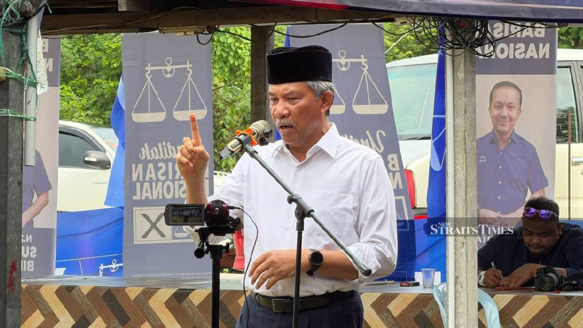 Negri Sembilan polls: 'Ignore slander, BN and PAS not merging,' says Tok Mat