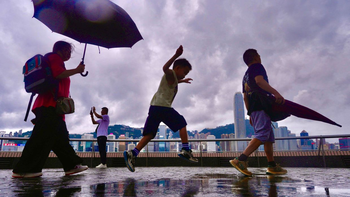 Rain breaks Hong Kong's oppressive heat wave as temperatures ease after record-setting surge