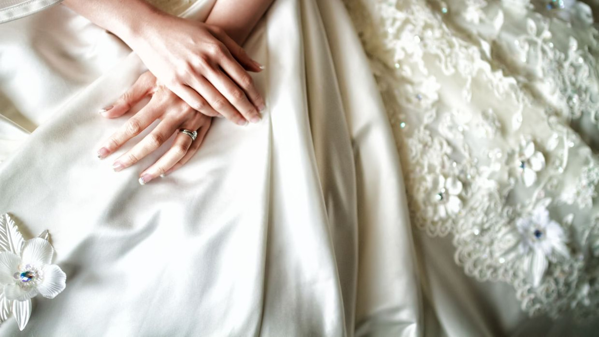 The Emotional Weight of Parting with Wedding Dresses: Why Memory Holds Us Back