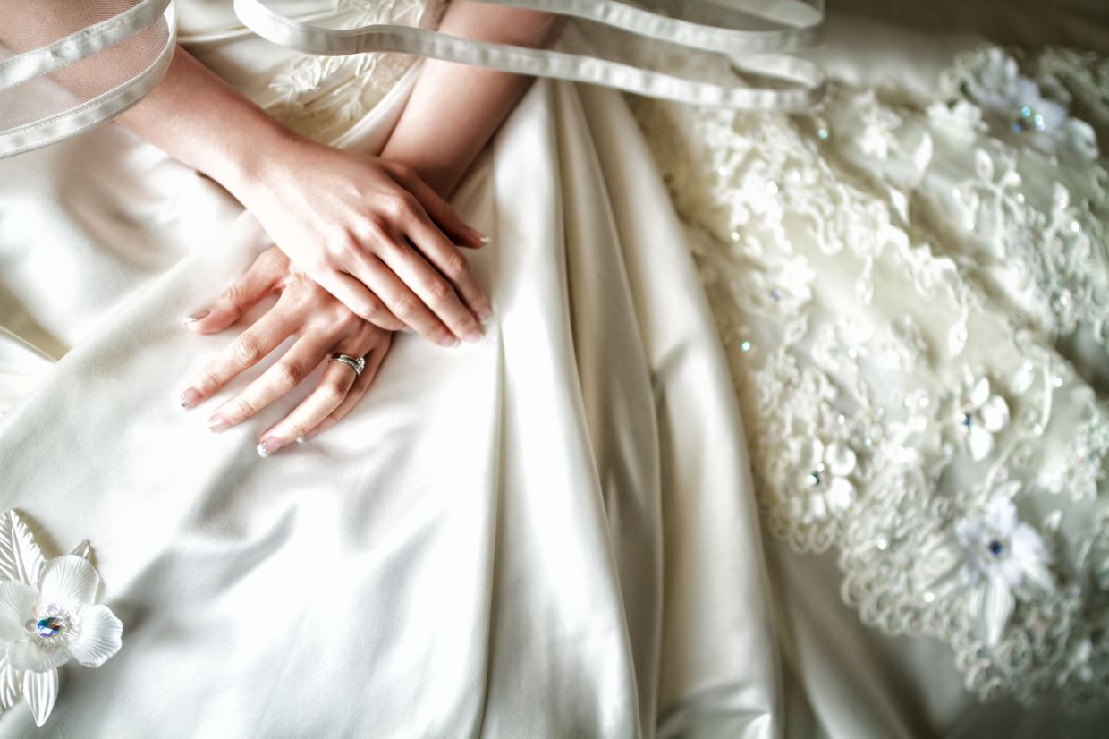 The Emotional Weight of Parting with Wedding Dresses: Why Memory Holds Us Back
