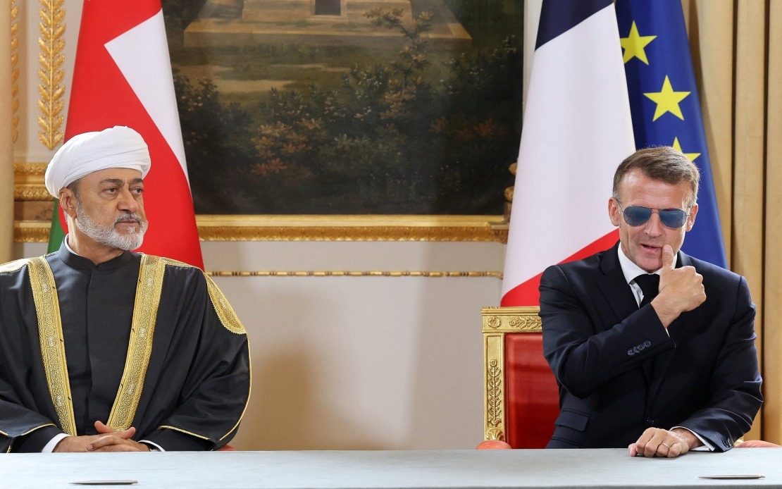 Macron's Aviators Return: Medical Reasons Behind French Leader's Signature Shades at Oman Talks