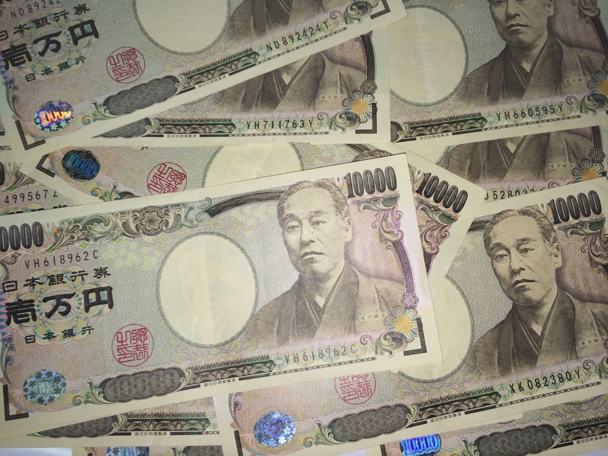 Yen slides to 40-year lows despite Bank of Japan rate hike and intervention efforts