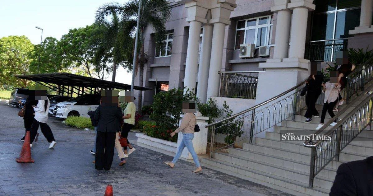 Kelantan Syariah Court adjourns case against 14 men accused of cross-dressing