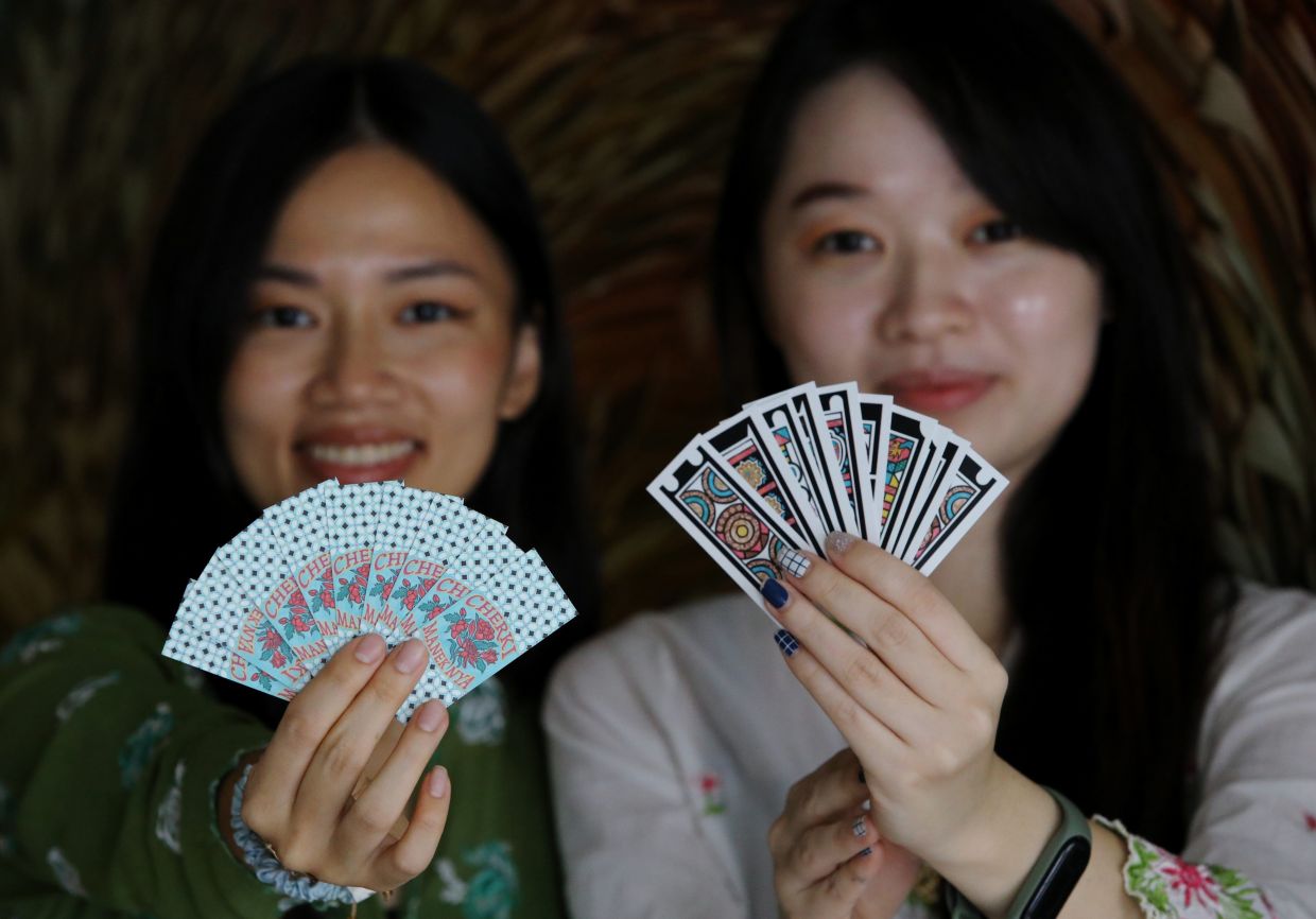 Sisters revive forgotten Peranakan card game Cherki with vibrant modern redesign