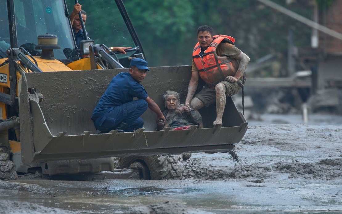 US and Canada Mobilize Aid for Nepal After Catastrophic Floods; Dozens of Citizens Missing