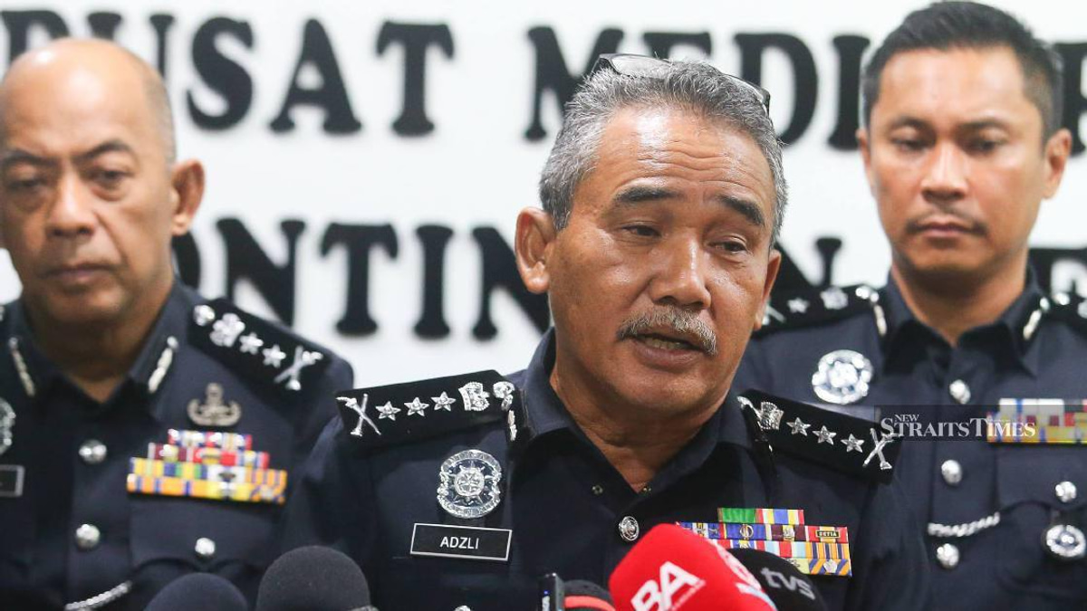 Three police officers held in connection with robberies targeting foreign nationals in Kedah
