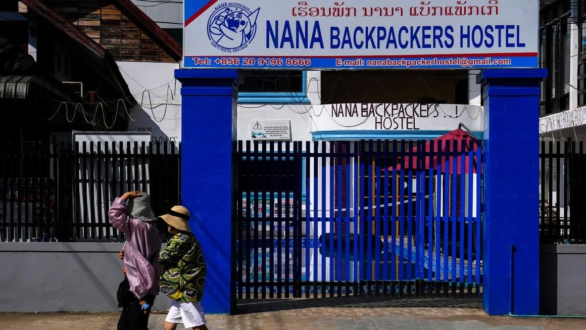 Laos charges distillery owner in tourists' methanol deaths, drawing Western anger