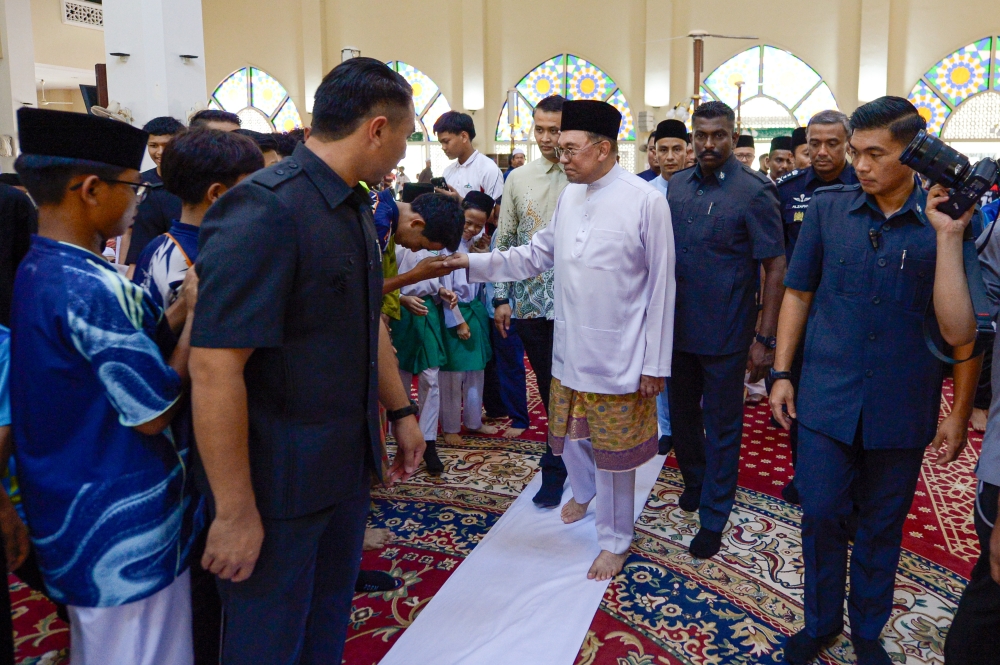 Malaysia's Q2 GDP Growth Hits 5.8% as PM Celebrates Improved Economic Performance