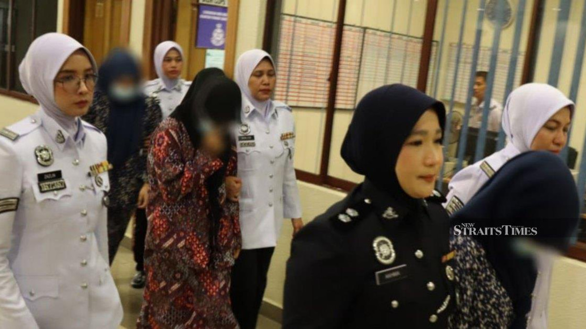 Three women charged over dangerous 'Superman' motorcycle stunts on Kuantan bypass