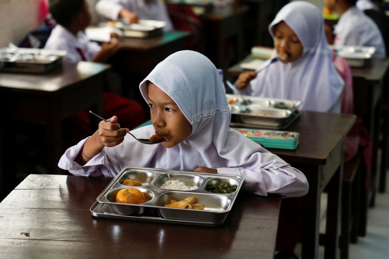 Indonesia's Education Law Revision Risks Reopening Free Meals Funding Dispute