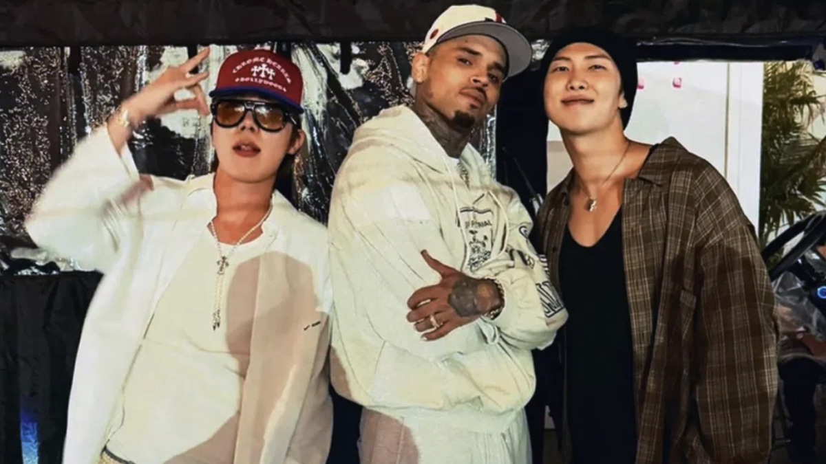 BTS Members' Chris Brown Concert Visit Sparks Fan Backlash Over Alleged Abuser Support